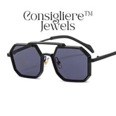 The Consigliere™ Jewels Luxury Sunglasses are stylish and classic unisex sunglasses featuring a black metal frame with polycarbonate lenses that provide UV400 protection. The sunglasses are personalized with laser engraved branding, making each pair unique. With a polygonal design theme reminiscent of the 80s and 90s, these sunglasses offer a touch of old-school charm in a modern frame. The temple length is 151mm, making them comfortable and fashionable for everyday wear.
